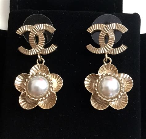 chanel cc dangle earrings gold|Chanel drop pearl earrings.